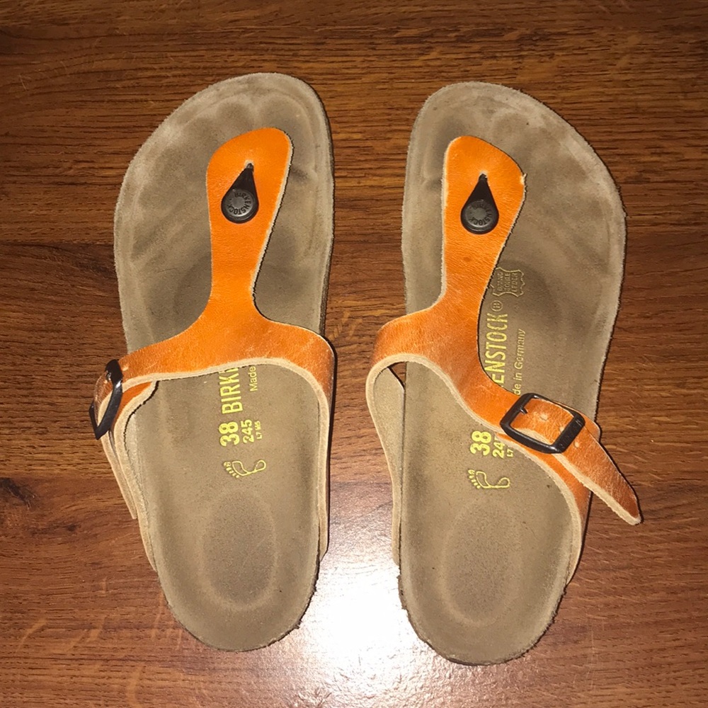 Orange thong strapped birkenstocks